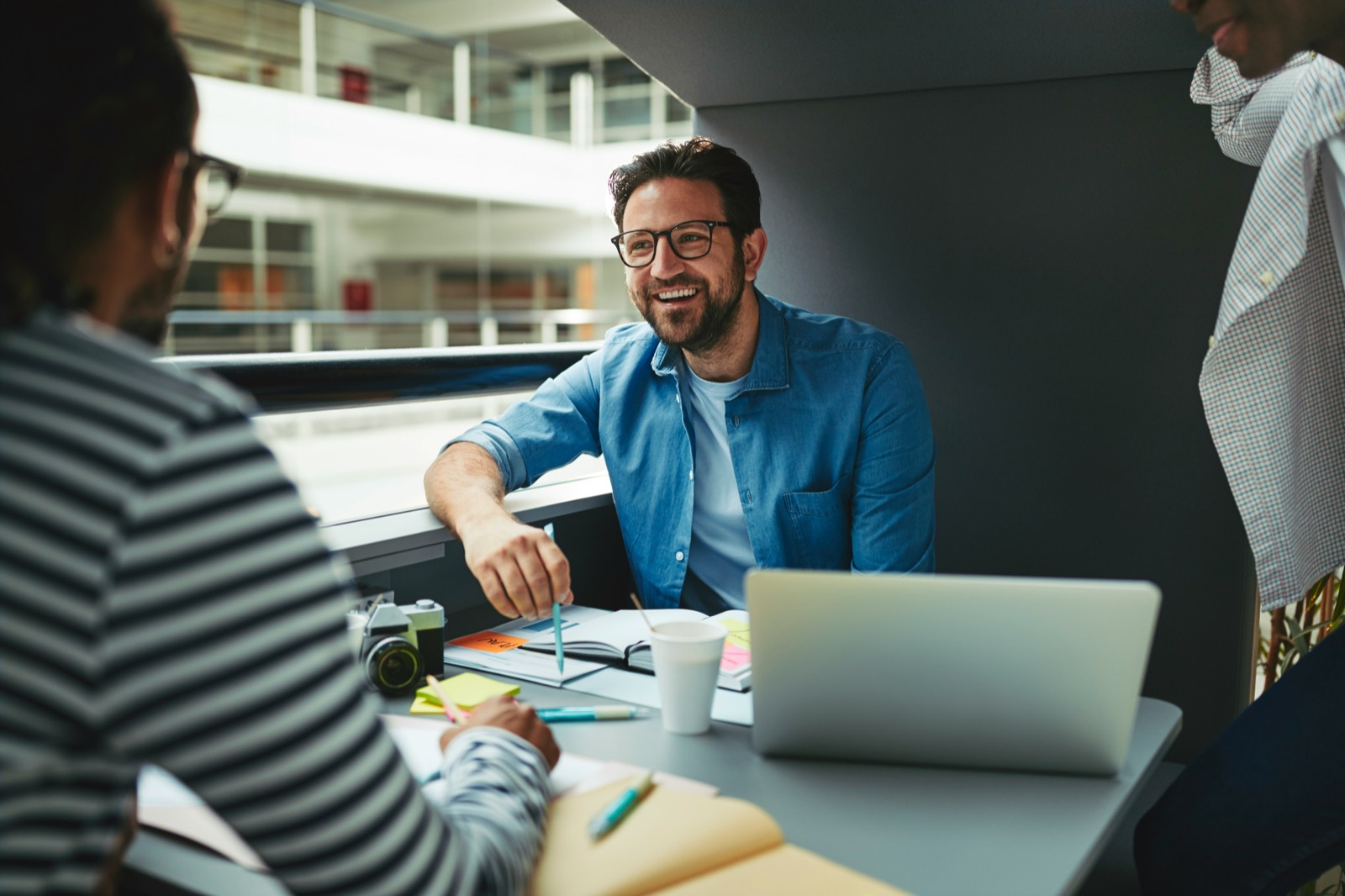 Experienced professionals collaborating in a working meeting